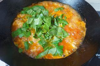 Tomato and Dough Drop Soup step 9: Add the chopped spinach and cook until wilted.