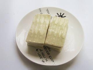 Pan-Fried Stinky Tofu step 2: Cut the stinky tofu into bite-sized pieces.