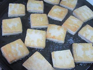 Pan-Fried Stinky Tofu step 5: Preheat a griddle or nonstick skillet over medium heat. Pan-fry the stinky tofu