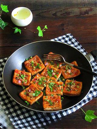 Pan-Fried Stinky Tofu step 8: Serve immediately while hot and crispy.