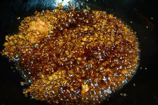 Garlic Chives Stir-Fry with Ground Pork step 3: Heat oil in a wok over medium-high heat. Add the ground pork and stir-fry until