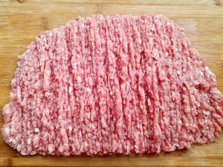 Homemade Pork Jerky step 1: Finely mince the pork shoulder or grind it in a food processor until smooth.