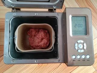 Homemade Pork Jerky step 8: Remove the seasoned pork mixture and prepare it for shaping.