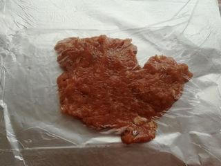 Homemade Pork Jerky step 9: Lightly grease a large sheet of aluminum foil. Place half of the pork mixture on