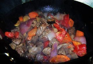 Tomato Braised Beef Brisket step 11: Cook until the tomato breaks down completely into a thick pulp.