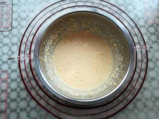 Coconut Custard Balls step 5: Add the sugar and continue mixing until fully incorporated.