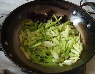 Celery Stir-Fry with Lily Bulbs and Wood Ear Mushrooms step 7: Add the celery and stir-fry until slightly tender but still crisp.