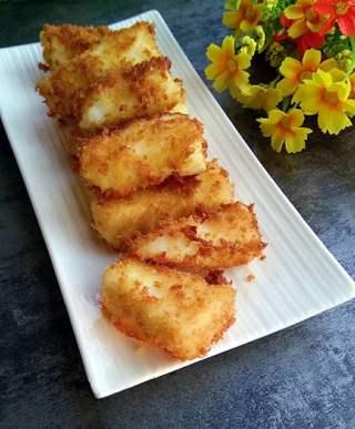 Crispy Fried Milk Recipe step 12: Enjoy the crispy exterior and creamy milk filling.