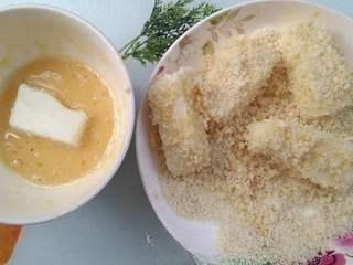 Crispy Fried Milk Recipe step 8: Coat each custard piece in batter, then cover evenly with panko breadcrumbs.