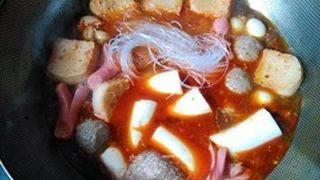 Spicy Hot Pot Noodle Soup step 8: Add the softened bean thread noodles and Japanese tofu. Simmer for several minut