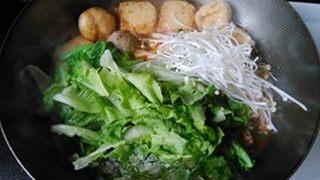 Spicy Hot Pot Noodle Soup step 9: Add the lettuce and enoki mushrooms. Cook just until tender.
