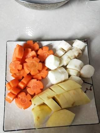 Braised Chicken with Shiitake Mushrooms and Root Vegetables step 10: Cut the Chinese yam, carrot, and potato into bite-sized chunks.
