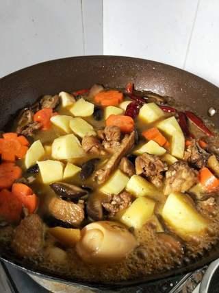 Braised Chicken with Shiitake Mushrooms and Root Vegetables step 11: Add the vegetables to the wok.
