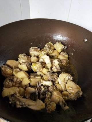 Braised Chicken with Shiitake Mushrooms and Root Vegetables step 4: Heat oil in a wok over medium-high heat. Add the chicken and stir-fry until ligh