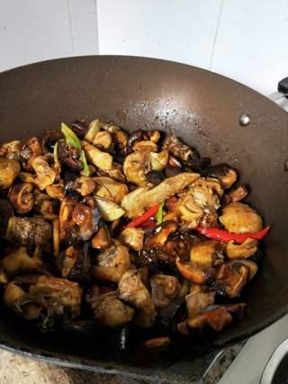 Braised Chicken with Shiitake Mushrooms and Root Vegetables step 7: Stir in the dark soy sauce and light soy sauce until the chicken is evenly coate