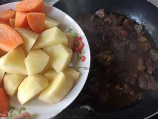 Braised Beef with Potatoes and Carrots step 12: Season with salt to taste and simmer until the sauce thickens slightly. Serve ho