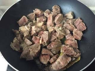 Braised Beef with Potatoes and Carrots step 9: Add the yellow bean paste and enough water to cover the beef. Bring to a boil, t