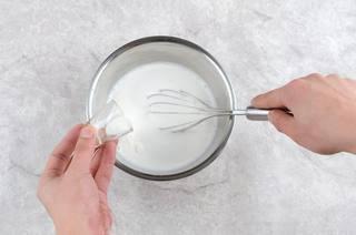 Homemade Coconut Yogurt step 4: Once the mixture cools to approximately 40°C (104°F), add the yogurt starter cul