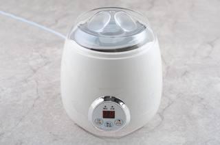 Homemade Coconut Yogurt step 5: Strain the mixture into a clean yogurt container. Ferment in a yogurt maker or w
