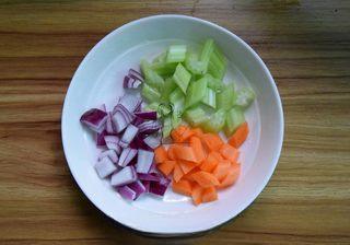 Roasted Enoki Mushroom Salad step 4: Peel the carrot and cut it into thin strips. Finely dice the celery and red onio
