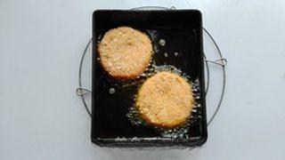 Pumpkin Red Bean Cakes step 8: Heat a small amount of oil in a skillet and cook the cakes over low heat, turnin