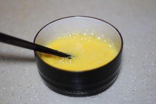 Omelette Fried Rice step 15: Beat the eggs until smooth. Mix the water and cornstarch into a slurry and stir 