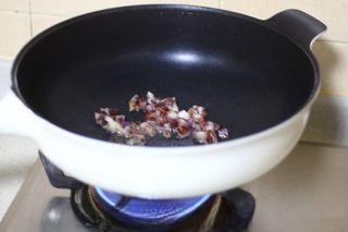 Omelette Fried Rice step 5: Add the diced Chinese sausage and cook slowly until it releases its oils.