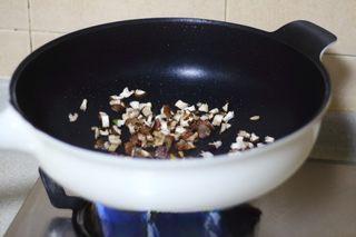 Omelette Fried Rice step 8: Cook until the mushrooms soften and release their moisture.