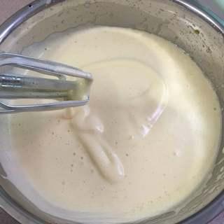 Easy Rice Cooker Sponge Cake Recipe step 3: Using an electric mixer, beat the mixture until pale, thick, and ribbon-like whe