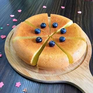 Easy Rice Cooker Sponge Cake Recipe step 8: Remove the cake and allow it to cool completely before slicing. Garnish with fre