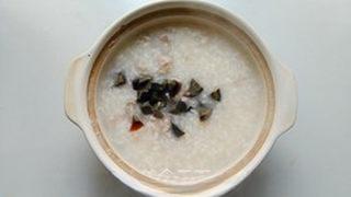 Century Egg and Pork Congee step 7: Stir in the diced century egg and white pepper. Cook for another minute until he