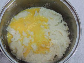 Classic Cream Puffs step 10: Gradually add the beaten eggs, mixing thoroughly after each addition until fully