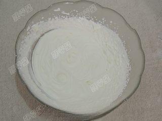 Classic Cream Puffs step 19: Transfer the whipped cream to a piping bag fitted with a decorative tip.