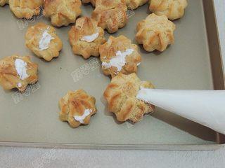 Classic Cream Puffs step 20: Allow the cream puffs to cool completely. Slice off the tops, fill with whipped
