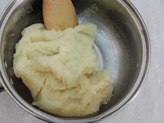Classic Cream Puffs step 8: Stir vigorously with a wooden spoon until a smooth dough forms and pulls away fr