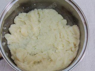 Classic Cream Puffs step 9: Transfer the dough to a bowl and stir for a few minutes to release excess heat.