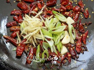 Sichuan Mala Chicken Recipe step 8: Add the scallions, ginger, and garlic. Stir-fry briefly.
