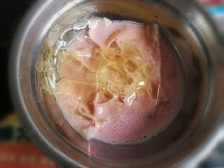 Strawberry Yogurt Mousse Cake step 16: Melt 2½ gelatin sheets and stir them into the strawberry mixture.