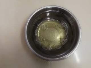 Strawberry Yogurt Mousse Cake step 23: Melt the remaining 1½ gelatin sheets and add them to the yogurt mousse mixture.