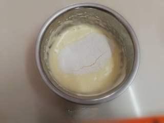 Strawberry Yogurt Mousse Cake step 4: Sift the cake flour into the egg mixture.