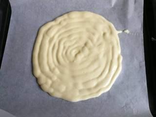 Strawberry Yogurt Mousse Cake step 7: Pipe a round cake layer onto a lined baking tray.