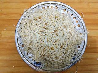 Stir-Fried Rice Noodles with Pork and Vegetables step 3: Loosen and separate the steamed noodles, then set aside.