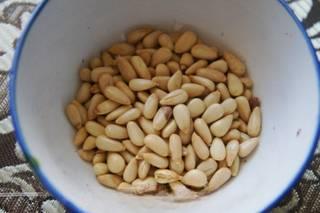 Stir-Fried Sweet Corn with Pine Nuts step 3: Toast the pine nuts until lightly golden and fragrant.