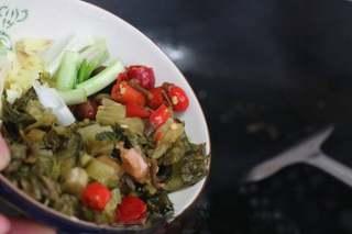 Sichuan Cod with Pickled Mustard Greens step 3: Heat a little oil in a wok and add the prepared pickled vegetables and aromatics