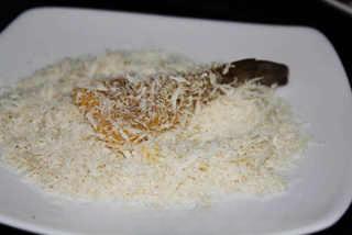 Crispy Breaded Prawns step 7: Roll the shrimp in breadcrumbs, pressing lightly so the coating adheres evenly.