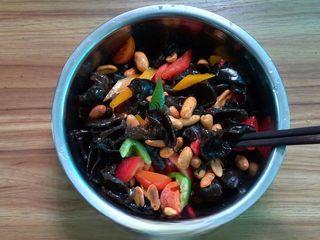 Spicy Black Fungus Salad with Peanuts step 8: Add the spicy sesame peanuts and toss everything together until evenly combined.