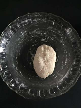 Stuffed Pancake with Egg and Sausage step 1: Combine the flour and salt in a bowl. Pour in the boiling water and stir quickly