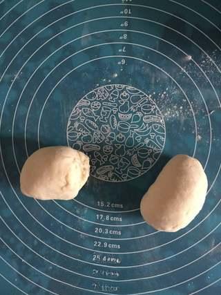 Stuffed Pancake with Egg and Sausage step 2: Knead the rested dough until smooth and divide it into two equal portions.