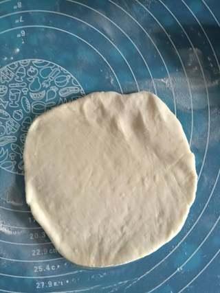 Stuffed Pancake with Egg and Sausage step 3: Roll each portion into a thin round sheet.