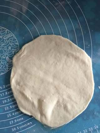 Stuffed Pancake with Egg and Sausage step 7: Gently roll out the dough again, taking care not to press out the trapped air.
